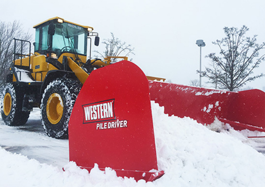 Stasi Brothers uses SDLG front loader with pile driver for snow removal
